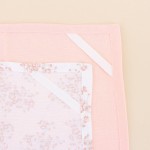 Torchon motifs fleuris blanc, orange