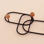 Patère design métal noir 35x20cm élégante | Hashtag Déco