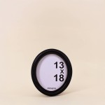 Cadre photo ovale noir résine 18x23 cm | Hashtag Déco