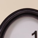 Cadre photo ovale noir résine 18x23 cm | Hashtag Déco