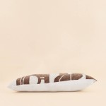 Coussin jacquard chenille marron motifs ethniques | Hashtag Déco